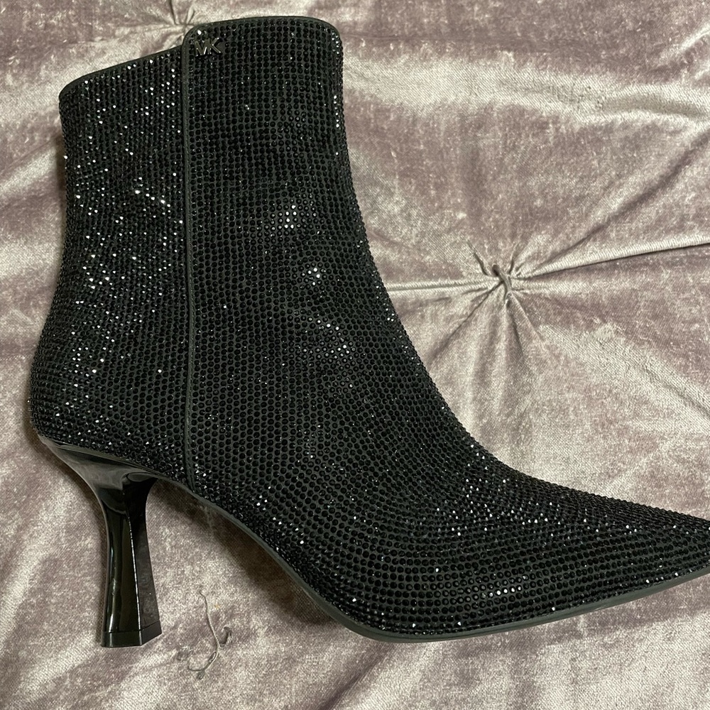 Sparkling black boots never been worn